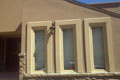Stucco - Diamond Back with Window Trim | Stone - Manufactured Sill